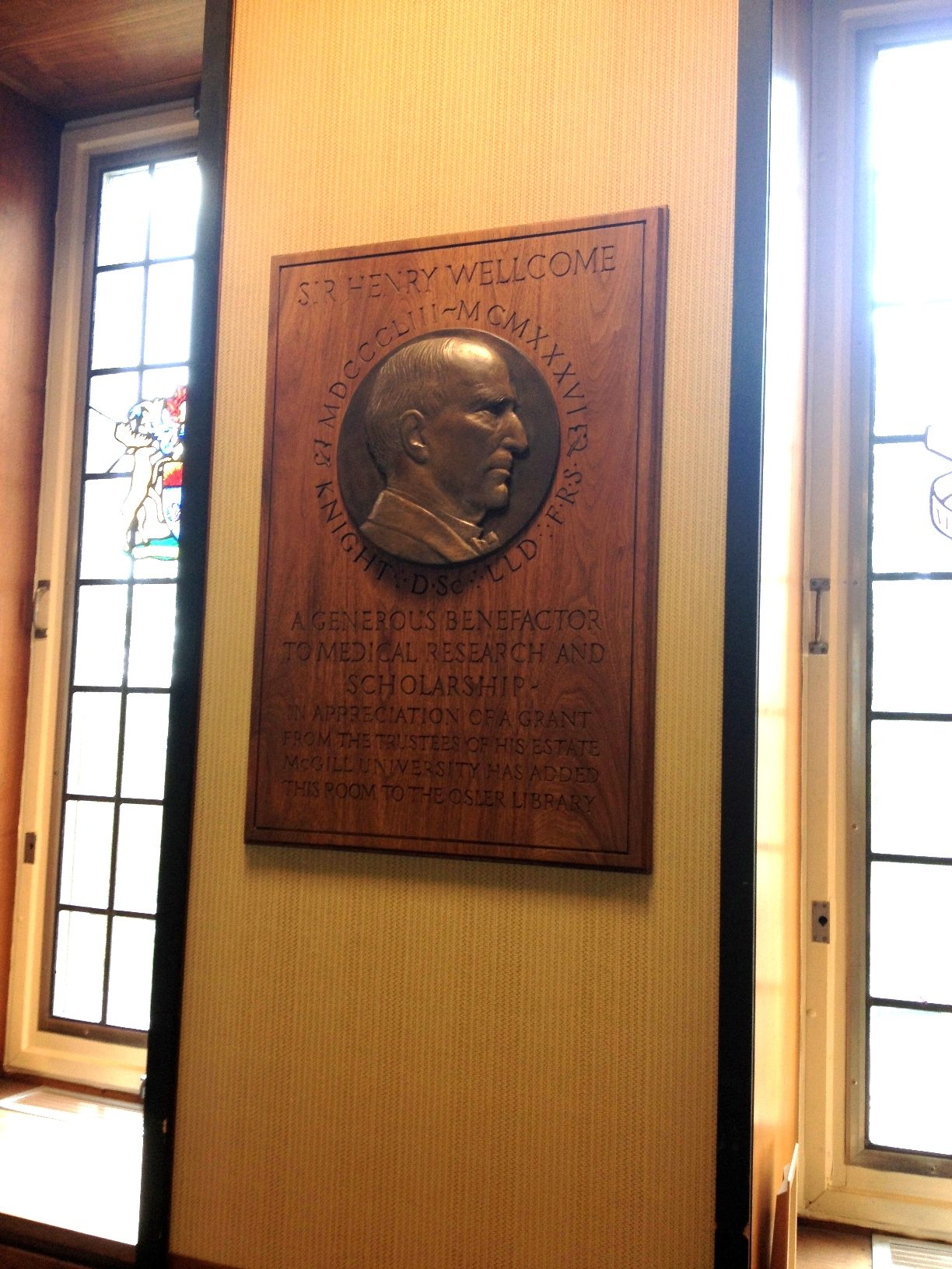 Henry Wellcome's memorial tablet, Osler Library of the History of Medicine, Montreal.jpg